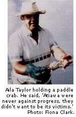 Aila Taylor holding a paddle crab.